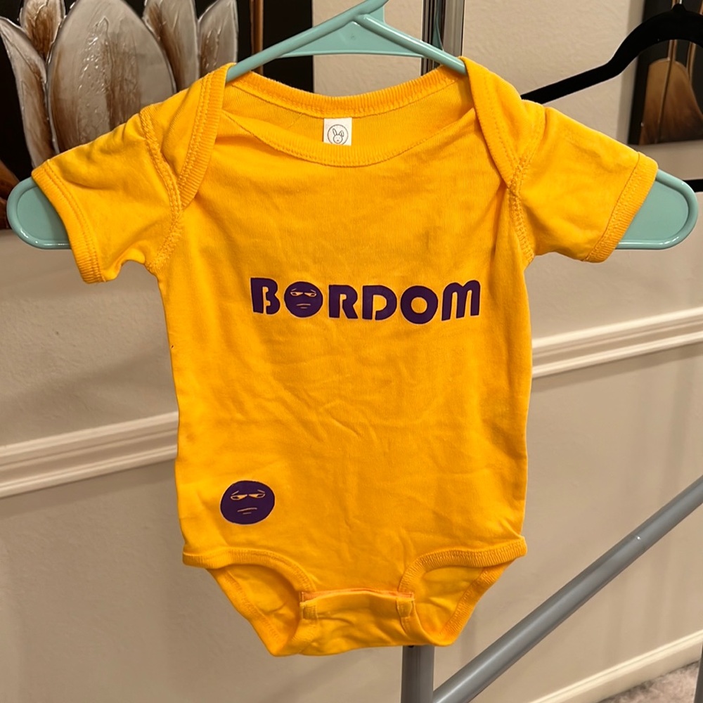 Purple and gold BORDOM onesie